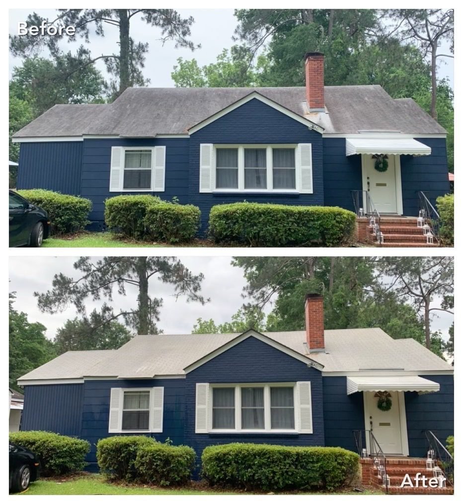 Before and after photo of our roof cleaning in Marysville WA on a blue house