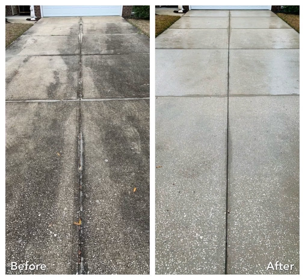 Before and after results of pressure washing in Marysville WA on a long concrete driveway