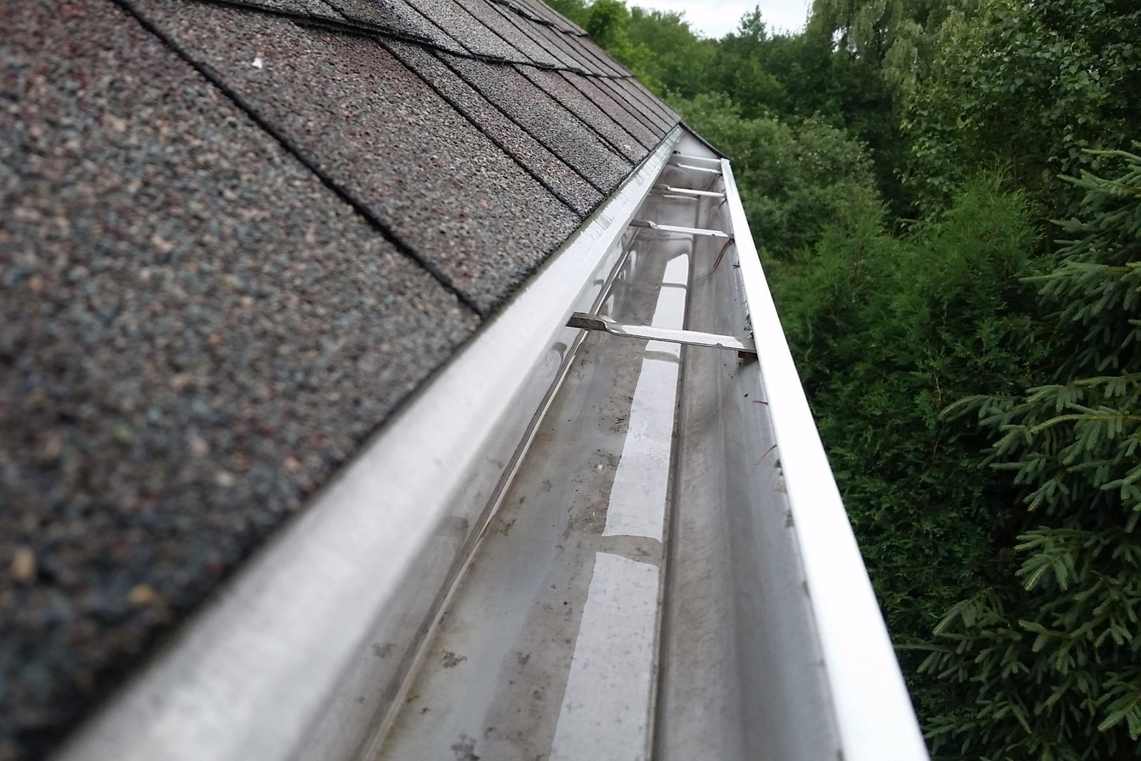 Close-up view of clean gutter after gutter cleaning in Arlington WA