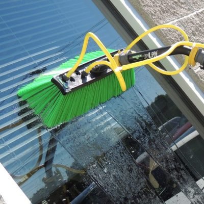 Performing residential window cleaning in Marysville WA with a waterfed pole